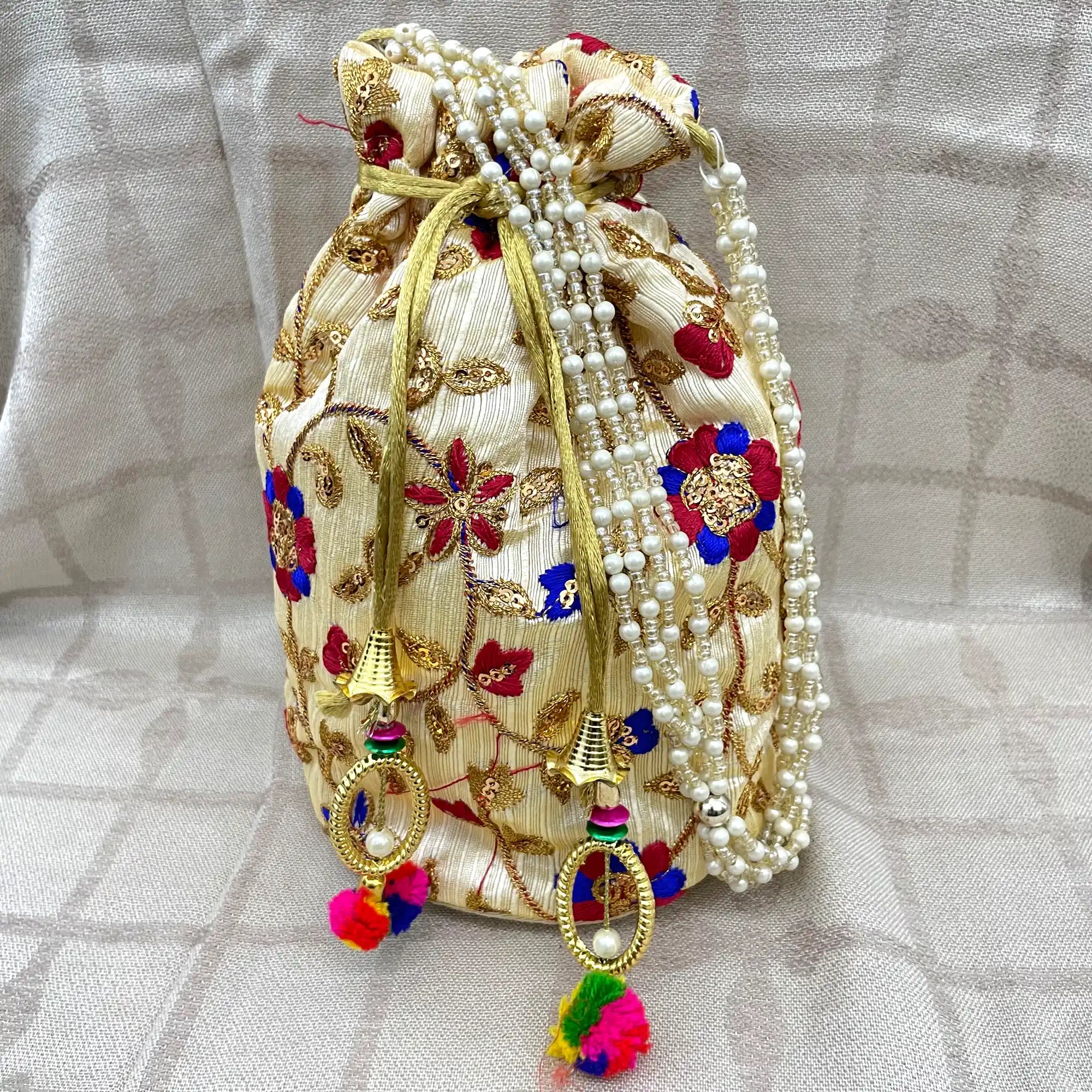 3_cbe25257-82eb-4d42-889d-57db2a13a3d9 Embroidery Potli Bags for Women with Colorful Thread Work